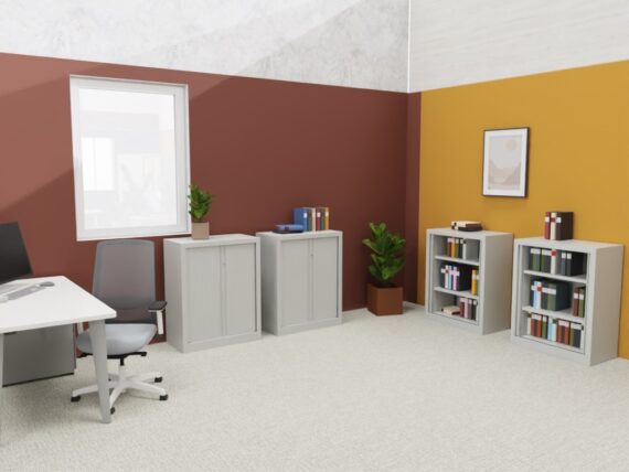 Bureau moderne avec deux armoires gris clair de la série PLUS H100 L80 et des rideaux, entourées de plantes vertes.