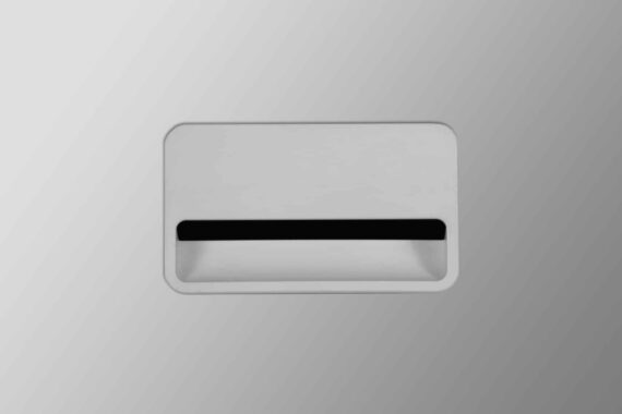 Poignée en aluminium pour classeur Soho Pierre Henry, design moderne et minimaliste sur fond gris.